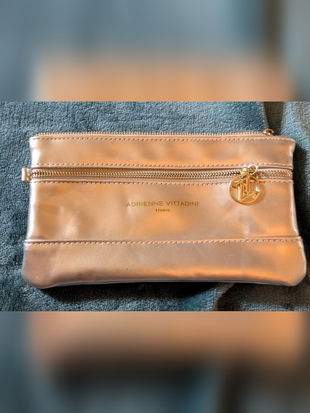 Adrienne Vittadini Metallic Gold Cosmetic Pouch with Logo Charm